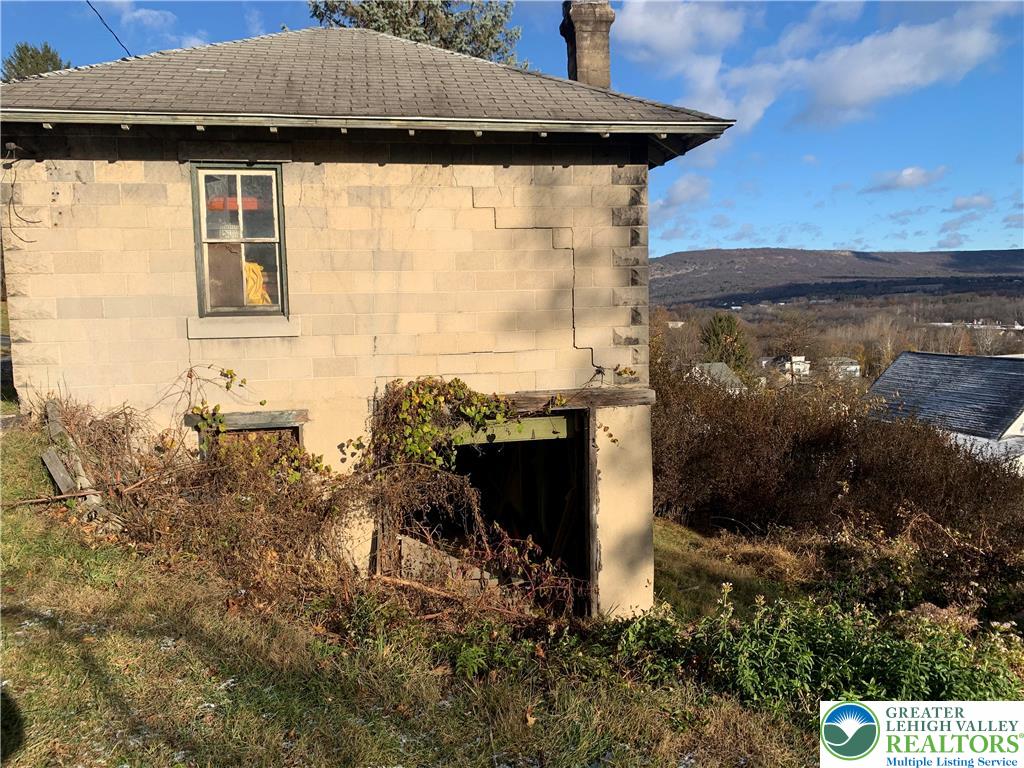 206 Hill Street Slatington, PA 18080 - Photo 3 of 8 a front view of a house with a yard