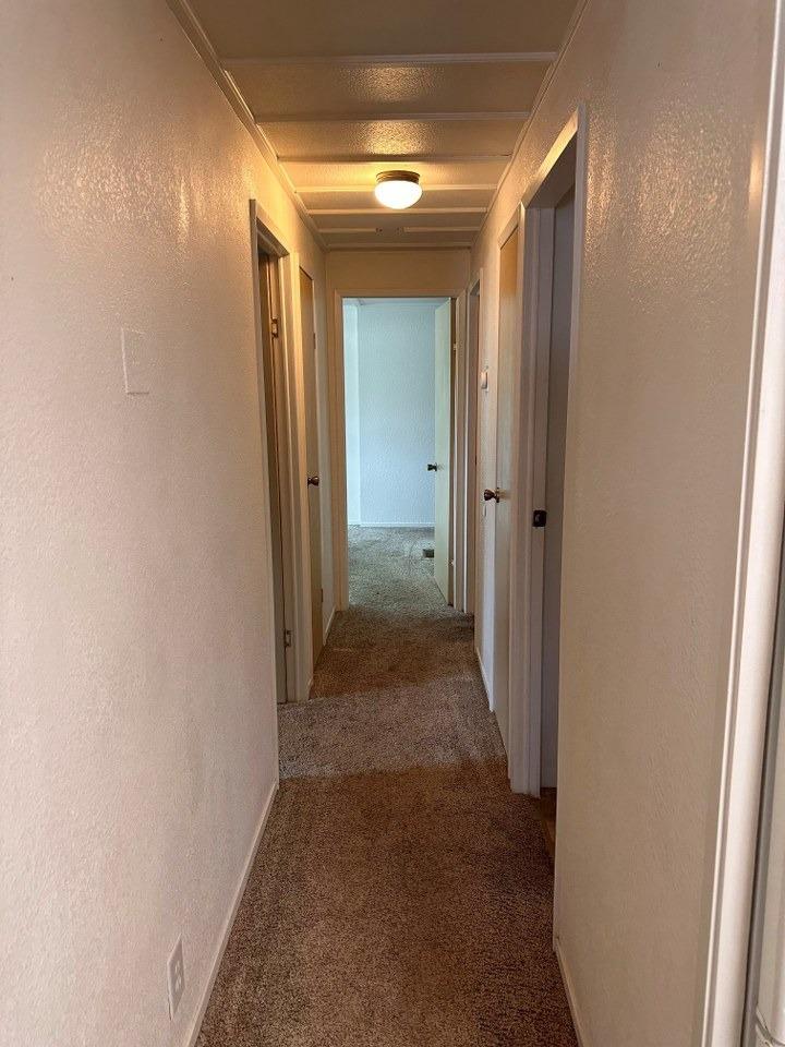 39678 Fresno Flats Road, Unit 39 Oakhurst, CA 93644 - Photo 13 of 34 a view of a hallway