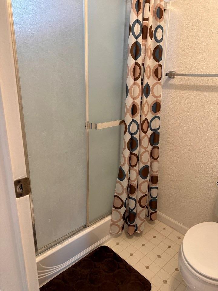 39678 Fresno Flats Road, Unit 39 Oakhurst, CA 93644 - Photo 24 of 34 a bathroom with a sink toilet and shower