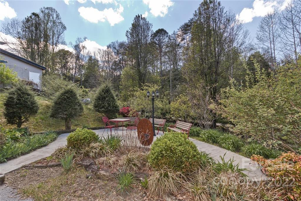 129 Moonlight Drive Sylva, NC 28779 - Photo 2 of 41 a view of a park with large trees
