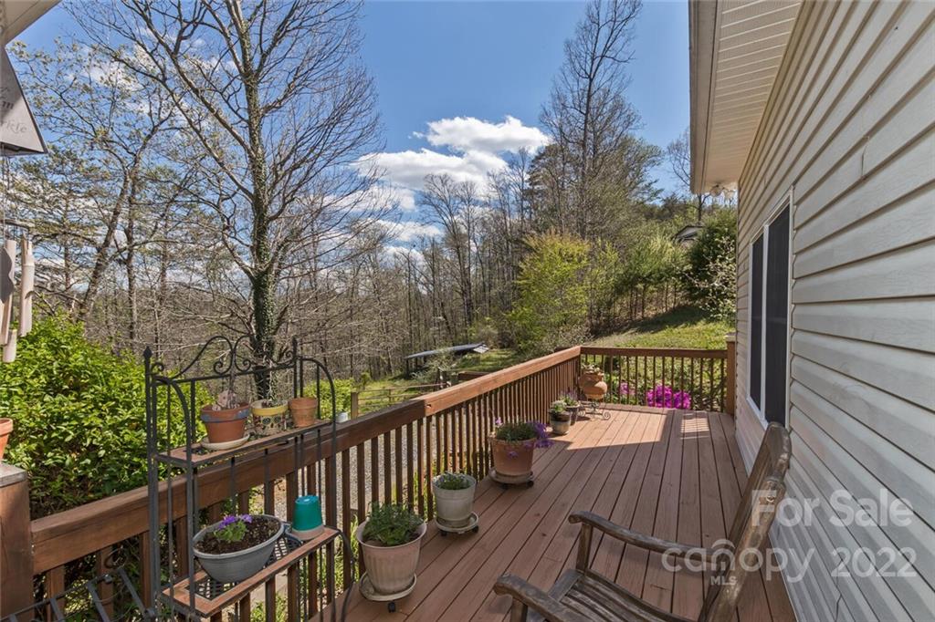 129 Moonlight Drive Sylva, NC 28779 - Photo 8 of 41 a view of a balcony with wooden floor