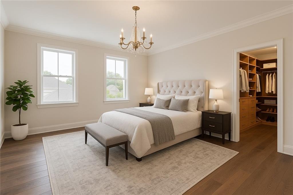 155 Edgewood Street Aliquippa, PA 15001 - Photo 14 of 45 a spacious bedroom with a bed and a chandelier