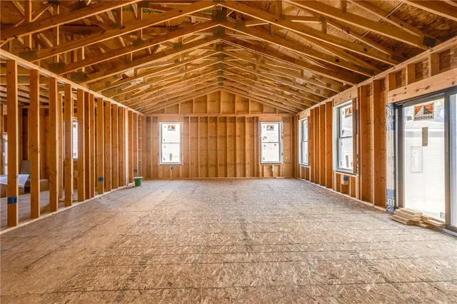 en empty room with windows