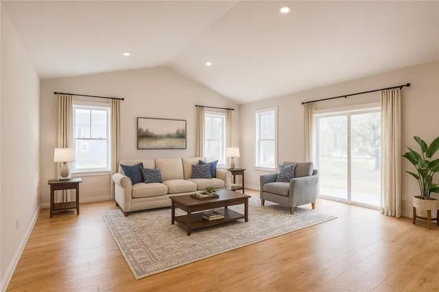 a view of an empty room with windows