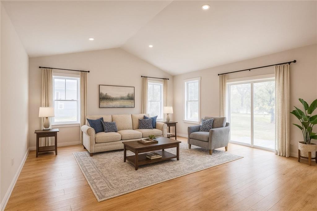 155 Edgewood Street Aliquippa, PA 15001 - Photo 30 of 45 a living room with furniture and a wooden floor