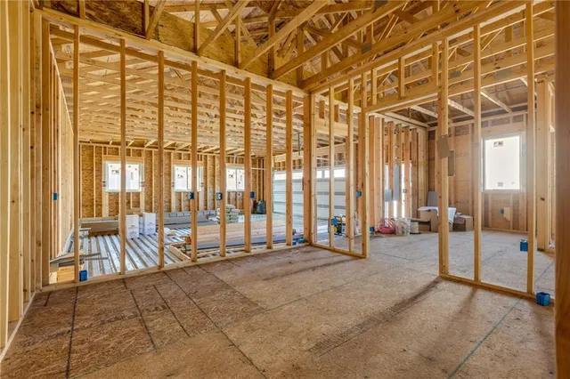 a house with tree in front of it