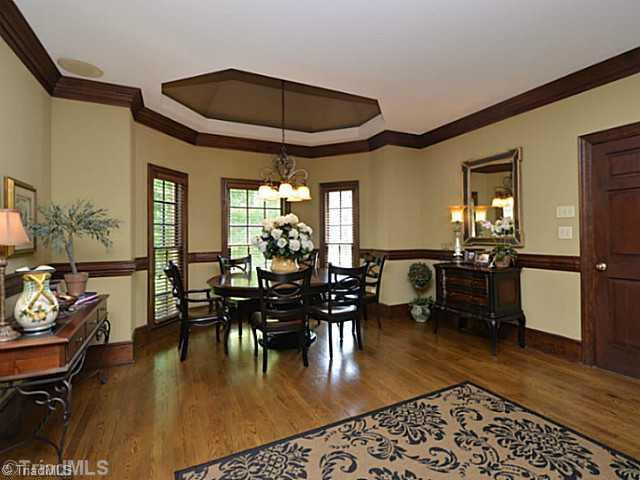 8231 Stafford Mill Road Oak Ridge, NC 27310 - Photo 8 of 16 Breakfast. Breakfast are features lighted trey ceiling and oversize area fit for 6 or even eight guests!