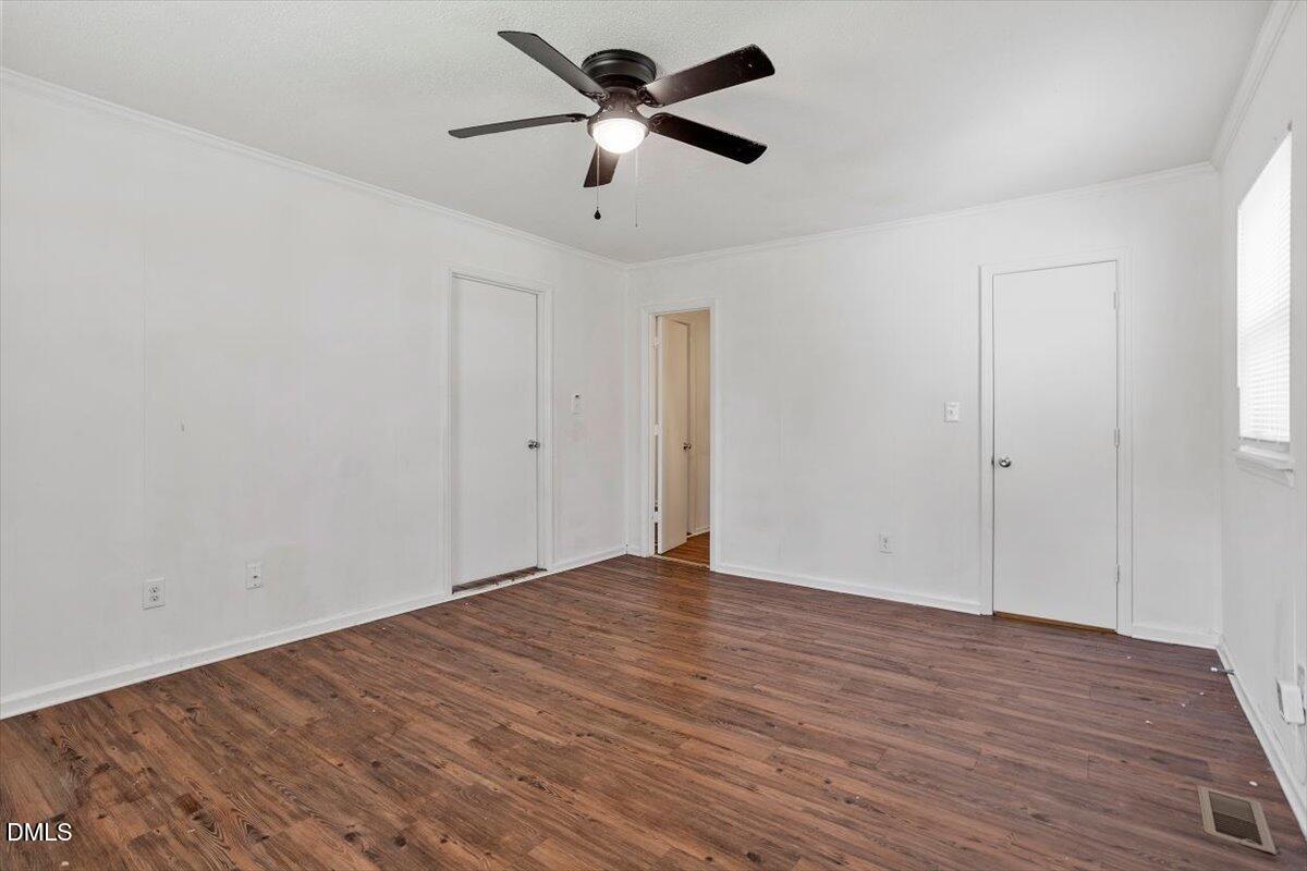 2000 Waters Drive Raleigh, NC 27610 - Photo 14 of 20 wooden floor in an empty room