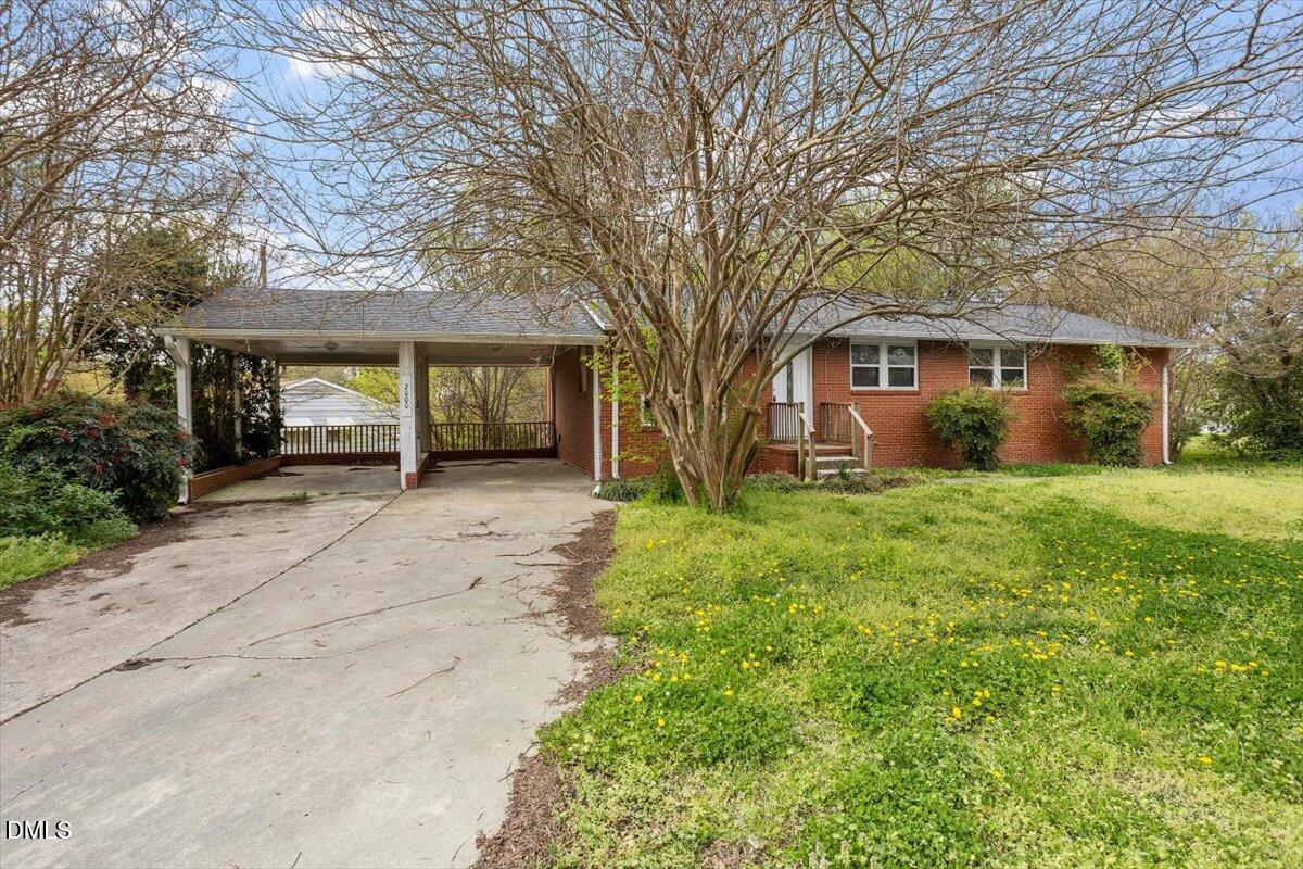 2000 Waters Drive Raleigh, NC 27610 - Photo 20 of 20 front view of a house with a yard