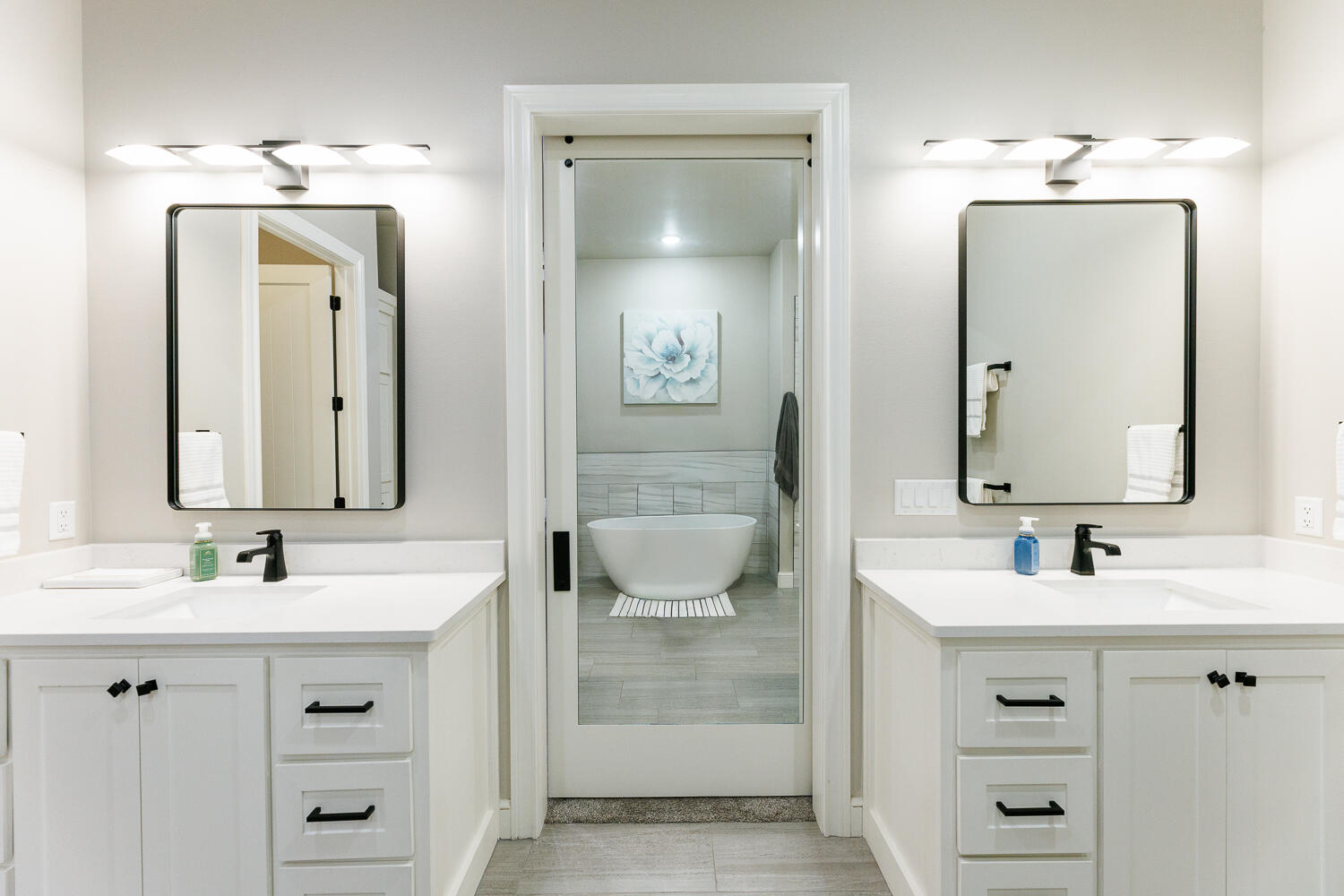5310 112th Street Lubbock, TX 79424 - Photo 15 of 36 a bathroom with a double vanity sink mirror and toilet