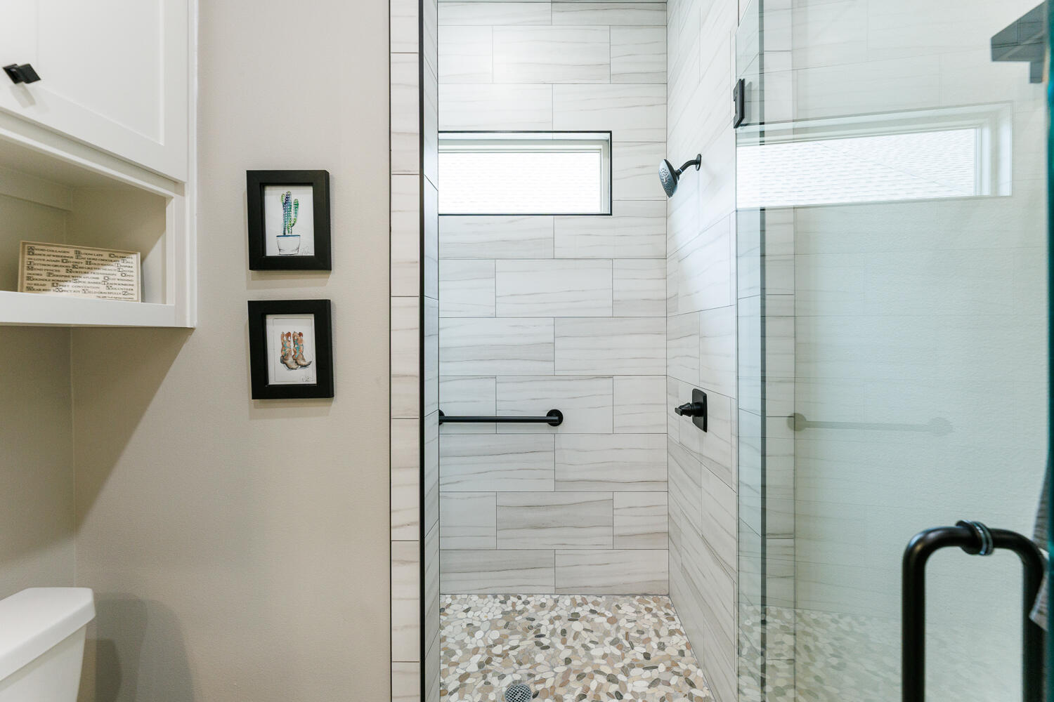5310 112th Street Lubbock, TX 79424 - Photo 25 of 36 a bathroom with a shower and a sink