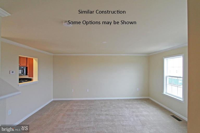 0 Rumbling Rock Road Hedgesville, WV 25427 - Photo 11 of 26 an empty room with a window