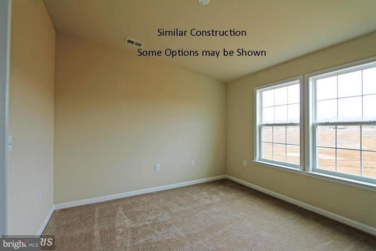 0 Rumbling Rock Road Hedgesville, WV 25427 - Photo 19 of 26 an empty room with a window