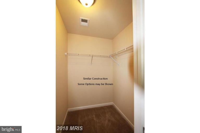 0 Rumbling Rock Road Hedgesville, WV 25427 - Photo 20 of 26 a bathroom with a shower and a sink