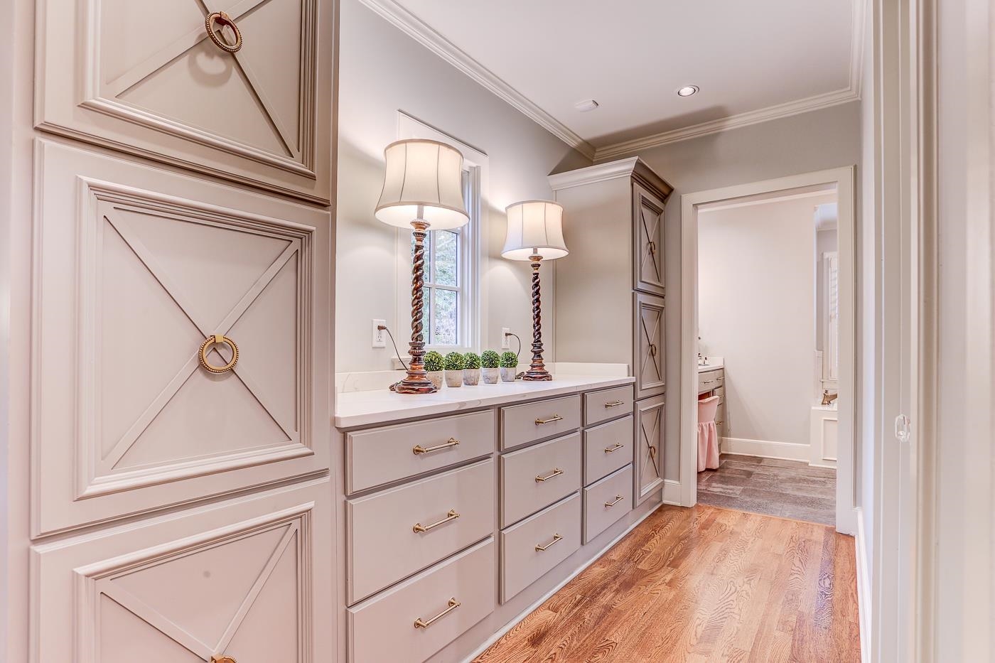 450 South Goodlett Street Memphis, TN 38117 - Photo 25 of 37 Bathroom with ornamental molding, light wood finished floors, and vanity