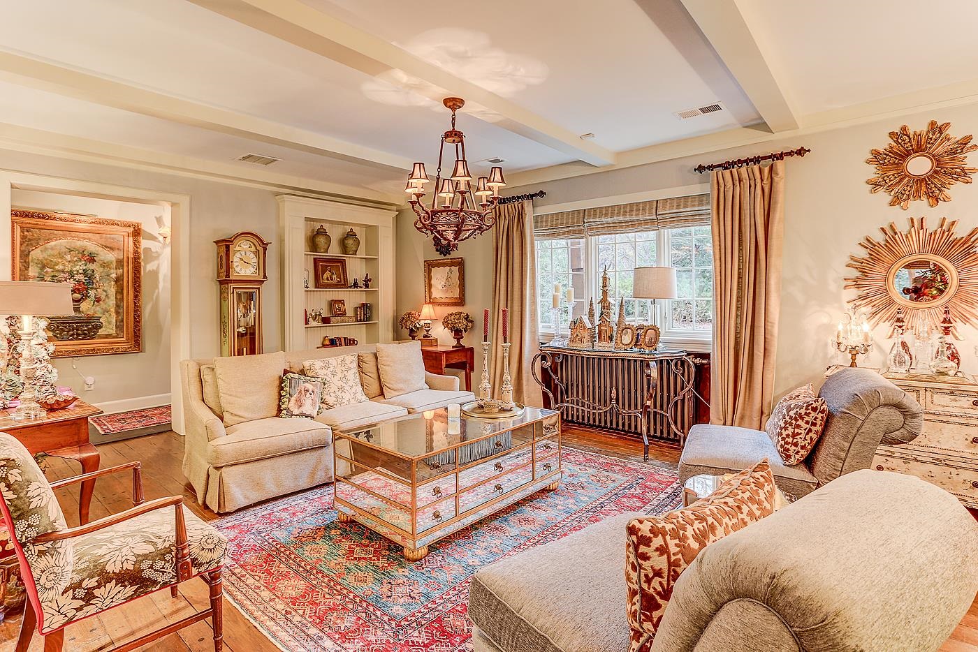 450 South Goodlett Street Memphis, TN 38117 - Photo 6 of 37 Living room with beam ceiling, wood-type flooring, a chandelier, and radiator