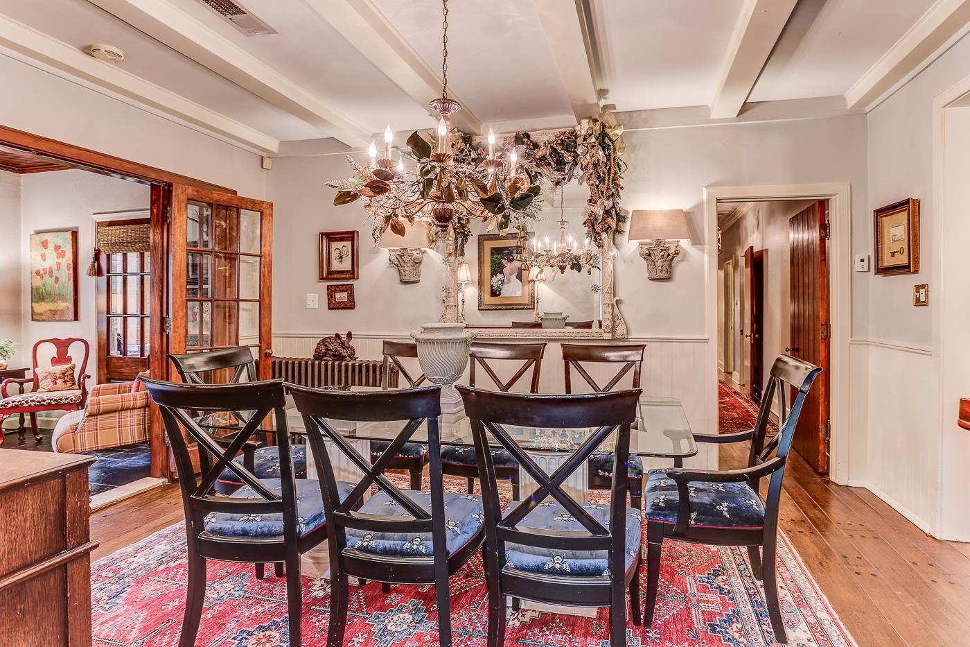 450 South Goodlett Street Memphis, TN 38117 - Photo 9 of 37 Dining room with light wood-style floors, beam ceiling, wainscoting, and a chandelier