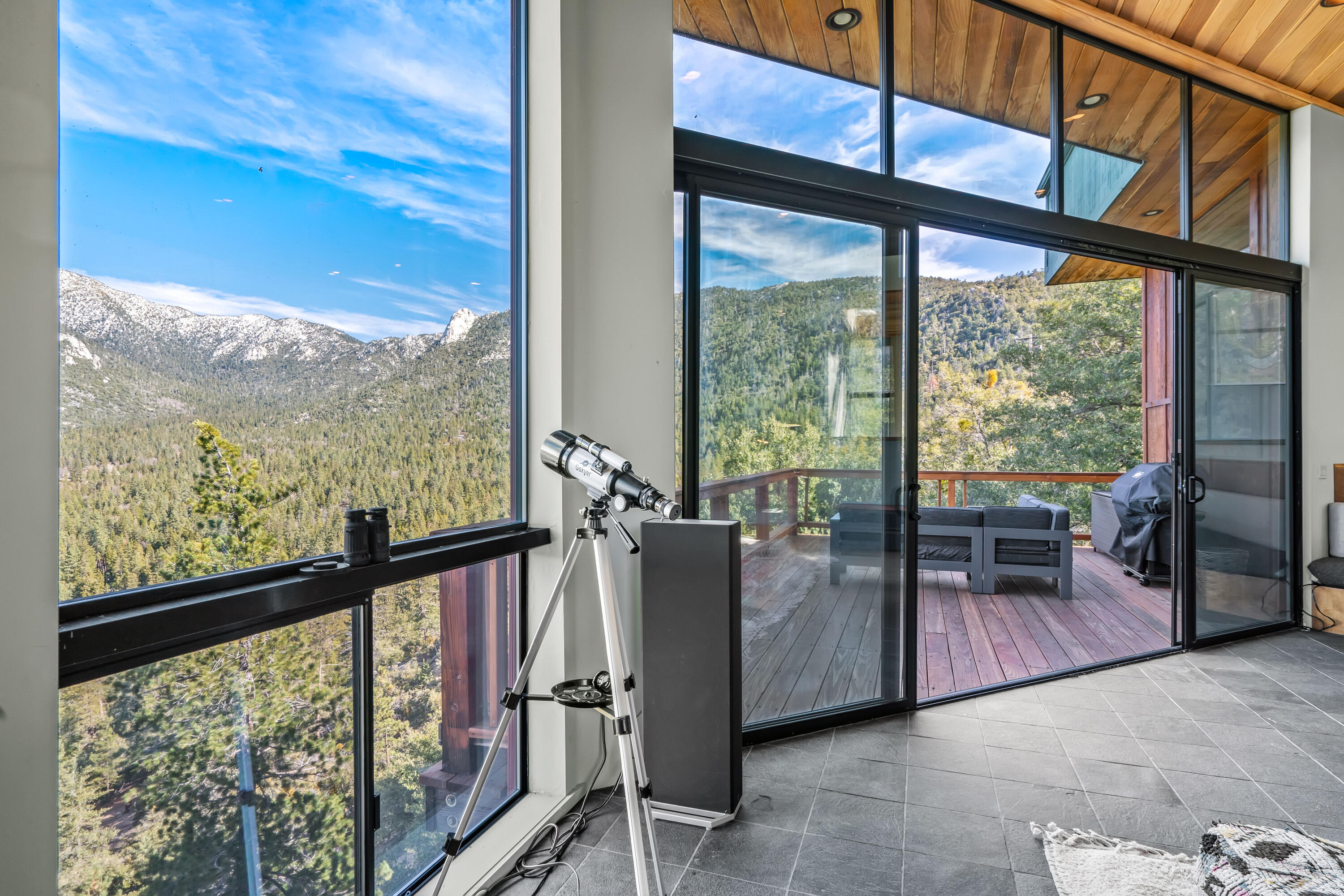 54685 Crest Drive Idyllwild, CA 92549 - Photo 14 of 50 a view of living room with furniture and floor to ceiling windows