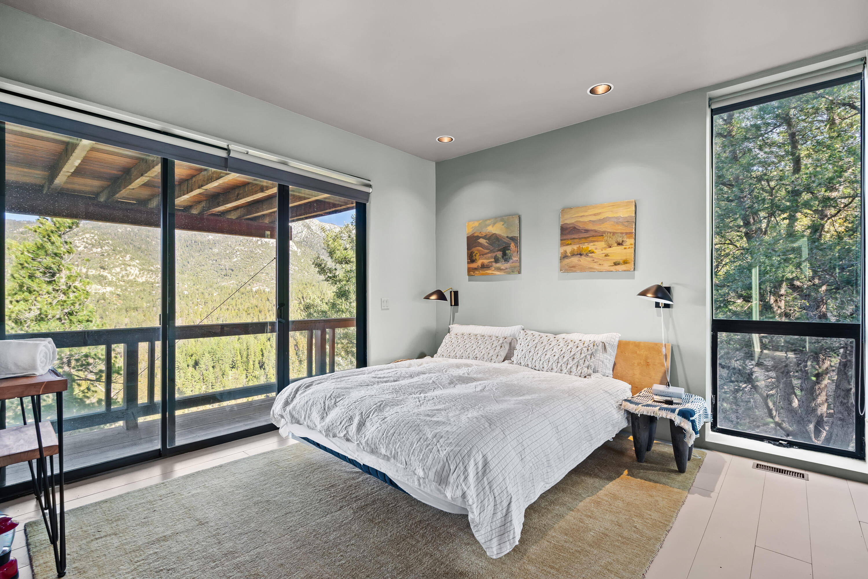 54685 Crest Drive Idyllwild, CA 92549 - Photo 34 of 50 a bedroom with a bed and a large window