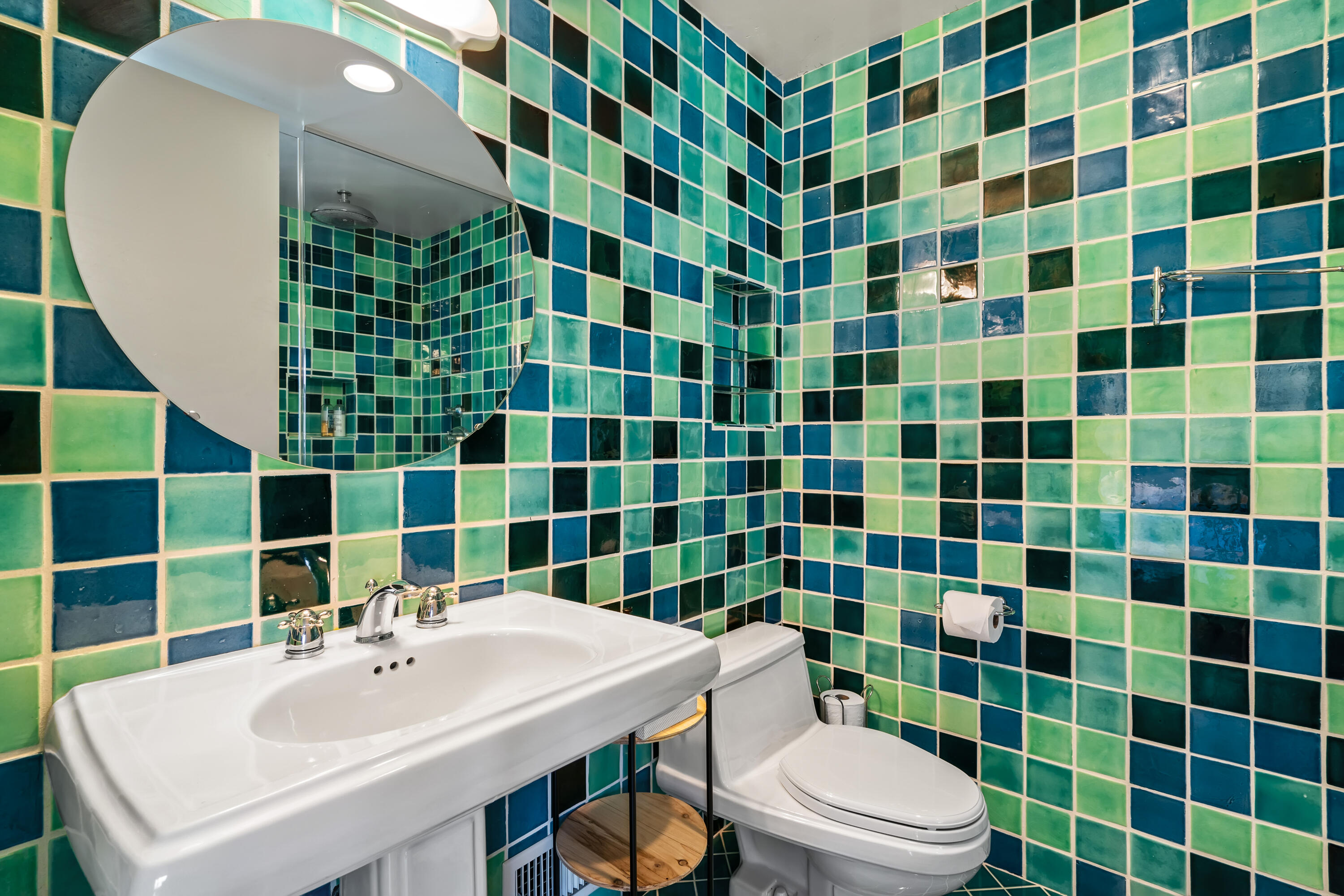 54685 Crest Drive Idyllwild, CA 92549 - Photo 38 of 50 a bathroom with a sink a toilet a mirror and shower