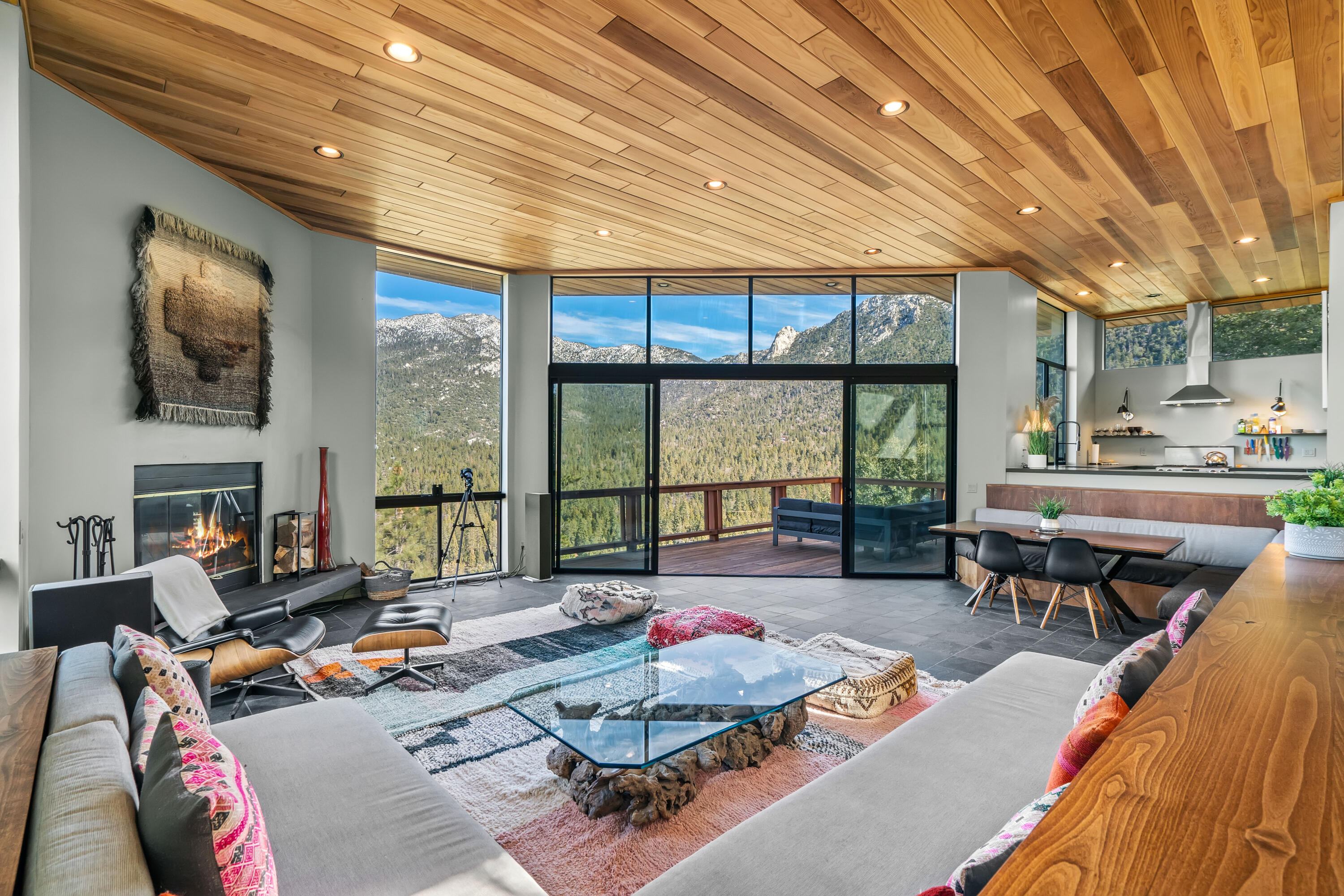 54685 Crest Drive Idyllwild, CA 92549 - Photo 8 of 50 a living room with furniture and a large window