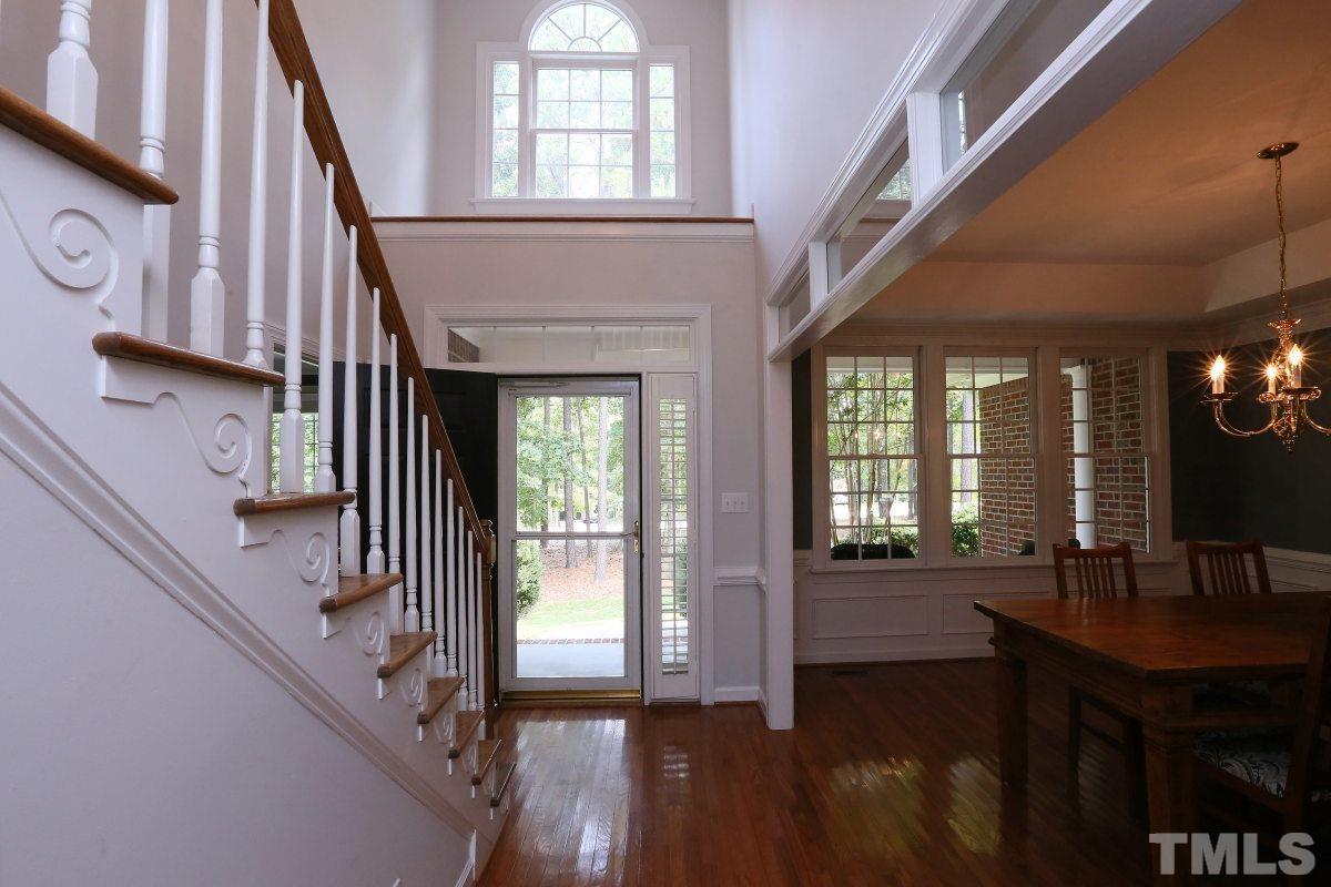 2621 Lizei Street Raleigh, NC 27616 - Photo 3 of 25 a view of front door and porch with wooden floor