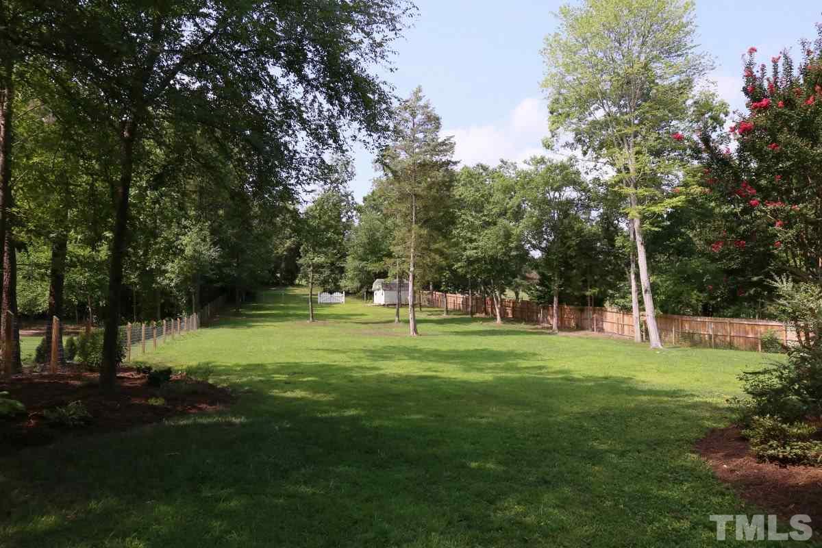 2621 Lizei Street Raleigh, NC 27616 - Photo 23 of 25 a view of a park with trees and grass