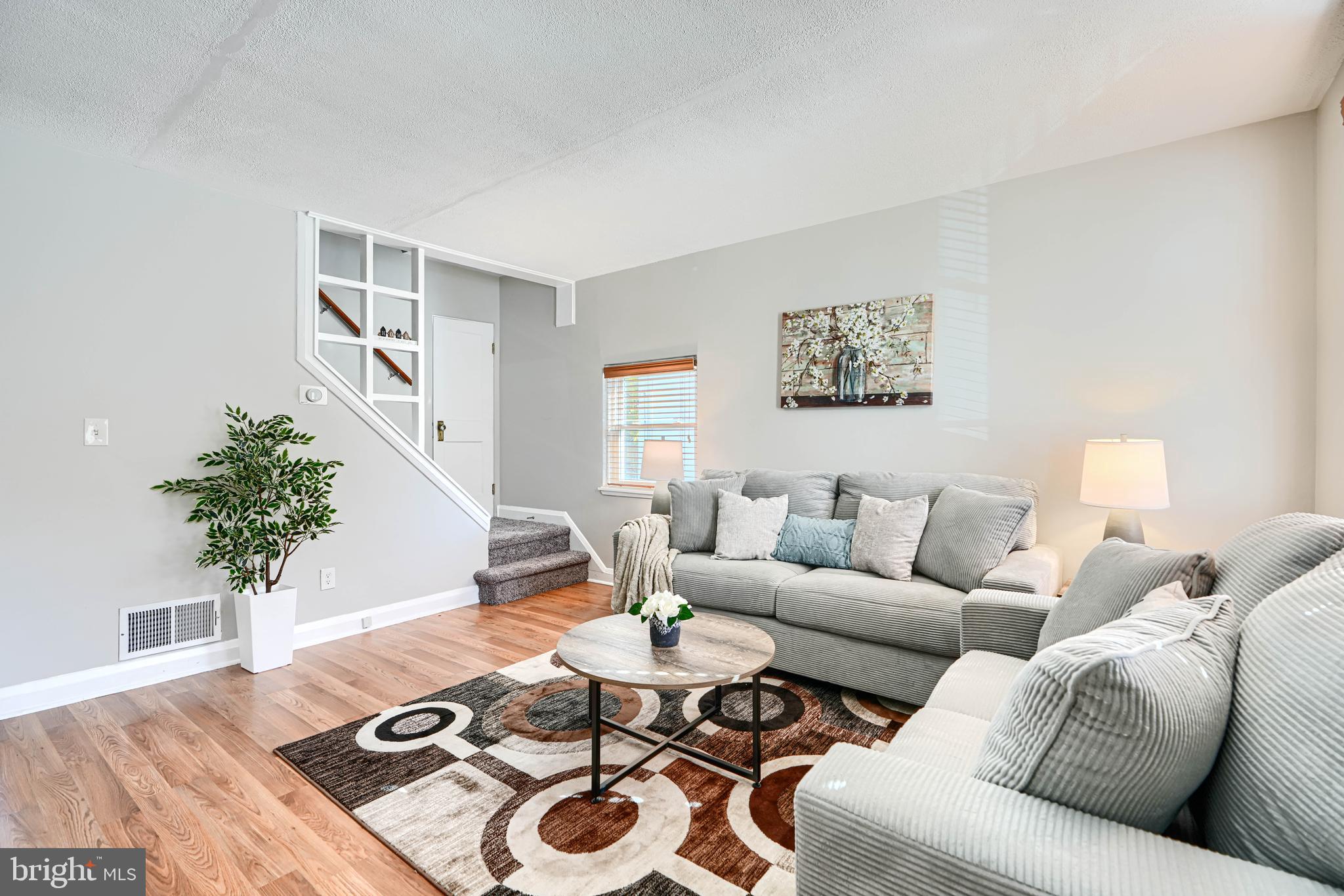 1620 Naturo Road Towson, MD 21286 - Photo 1 of 43 a living room with furniture and wooden floor