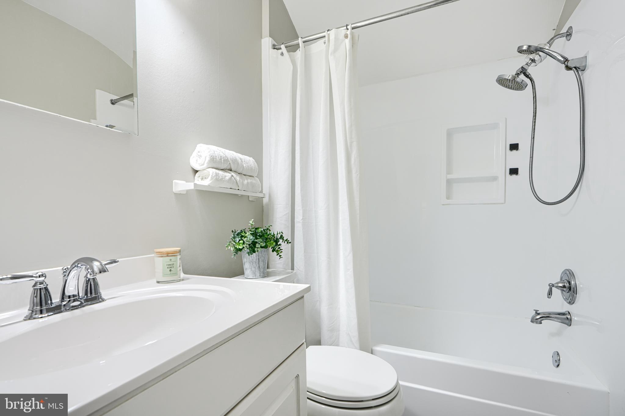 1620 Naturo Road Towson, MD 21286 - Photo 16 of 43 a bathroom with a sink vanity granite toilet and shower