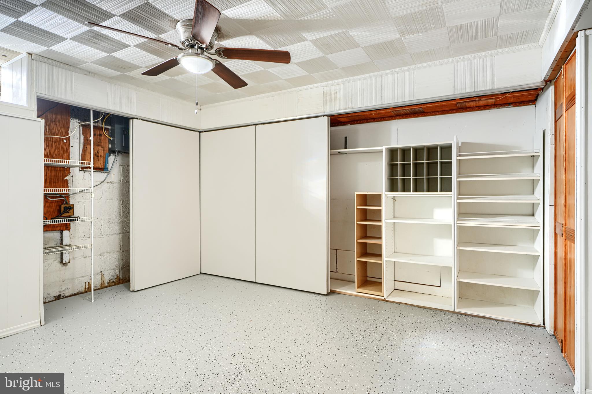 1620 Naturo Road Towson, MD 21286 - Photo 25 of 43 an empty room with closet and a ceiling fan