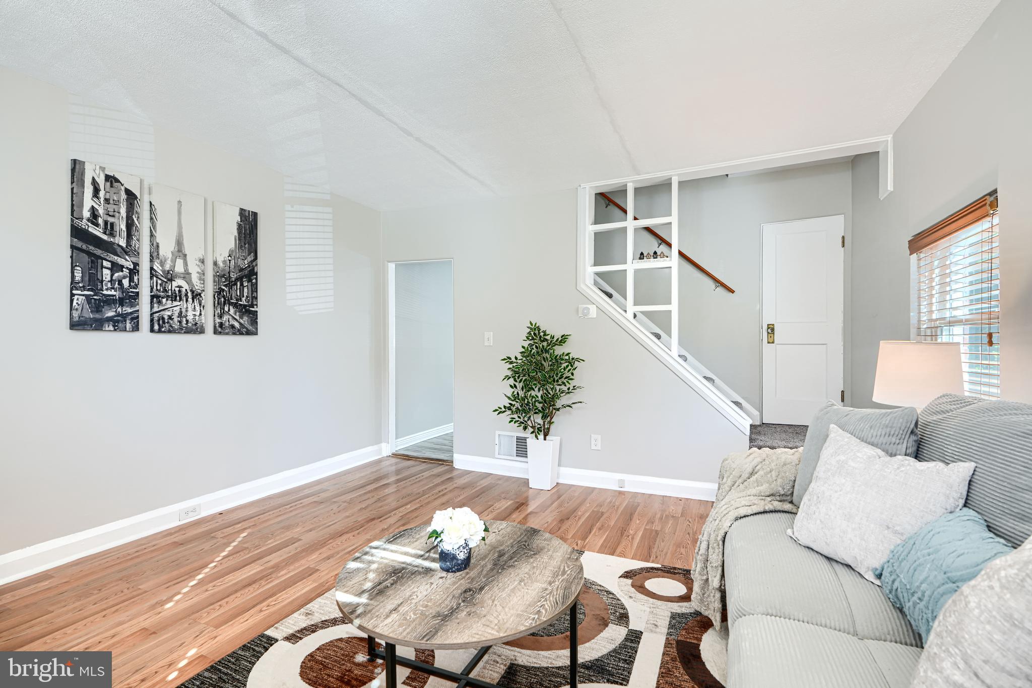 1620 Naturo Road Towson, MD 21286 - Photo 3 of 43 a living room with furniture and wooden floor