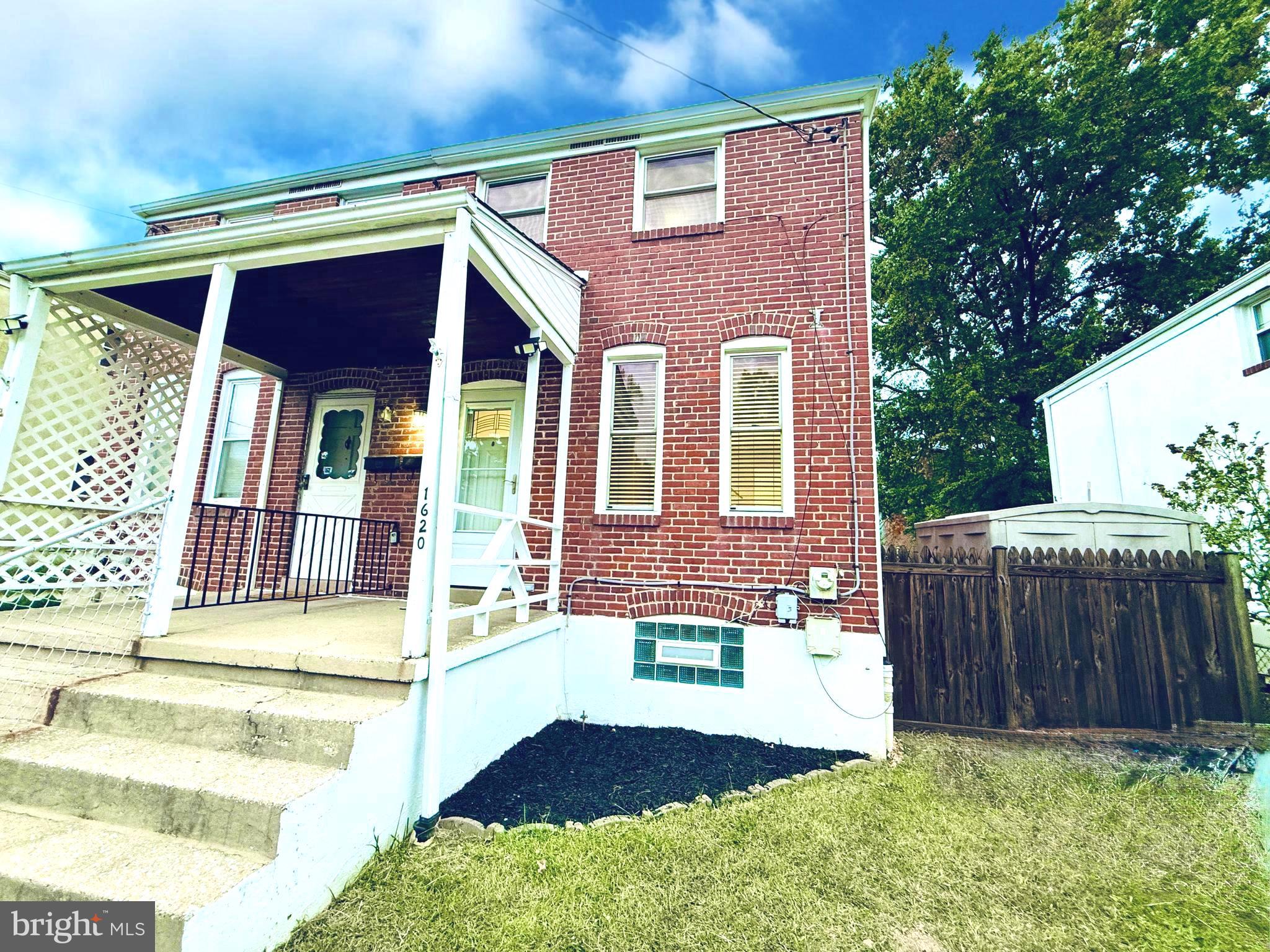 1620 Naturo Road Towson, MD 21286 - Photo 42 of 43 a view of a house with a small backyard