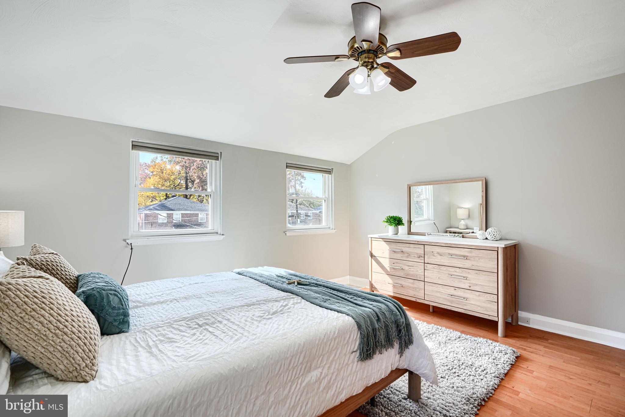 1620 Naturo Road Towson, MD 21286 - Photo 9 of 43 a bedroom with a bed chandelier and window