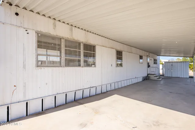 a view of a back yard of the house