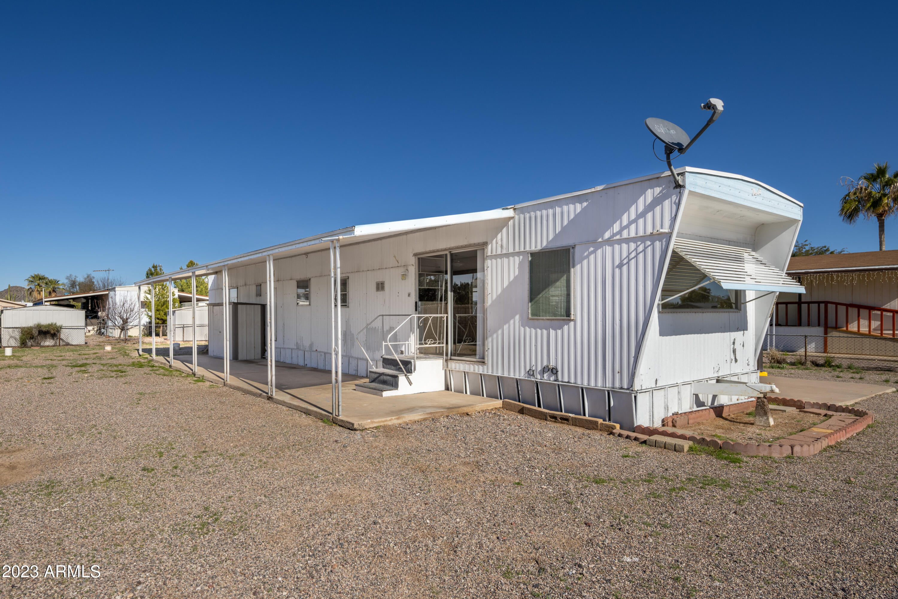 9618 East Aspen Circle Mesa, AZ 85208 - Photo 3 of 30 a view of a house with backyard