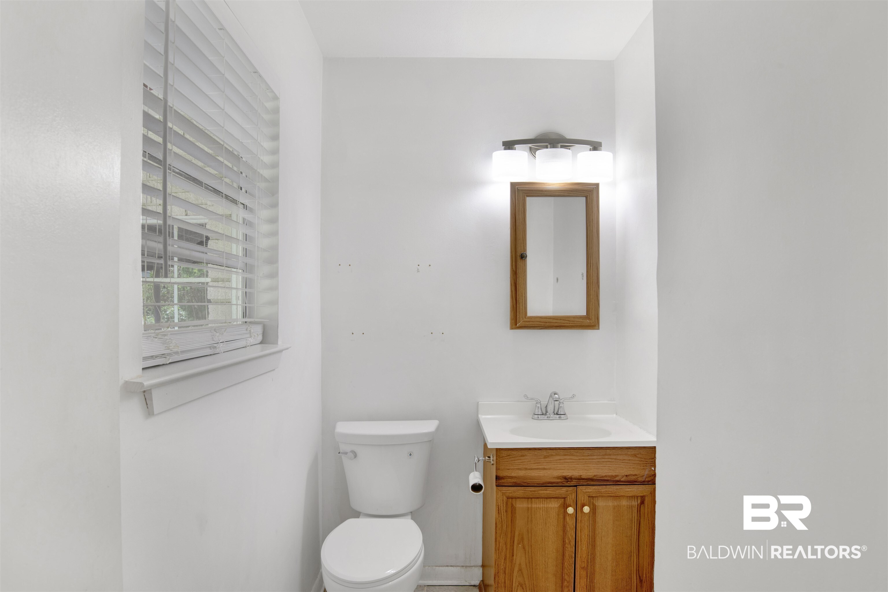 2 Lee Circle Daphne, AL 36527 - Photo 14 of 21 Bathroom with vanity and toilet