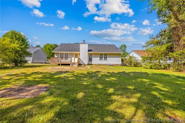 a view of a house with a big yard