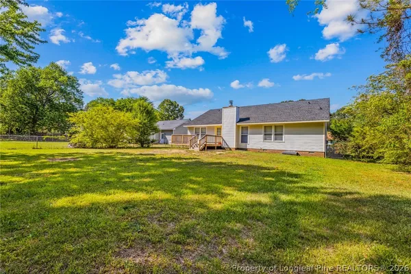 a view of a house with a big yard