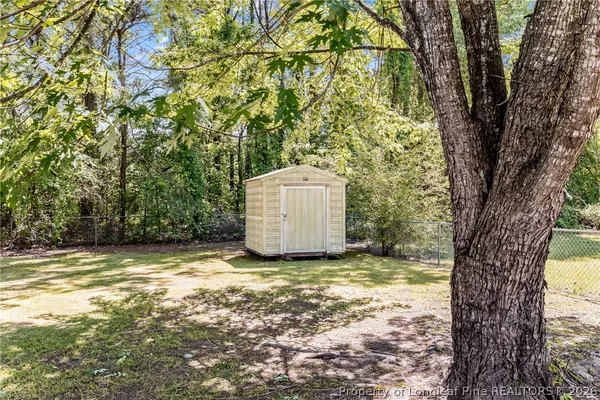 a view of a yard with a trees