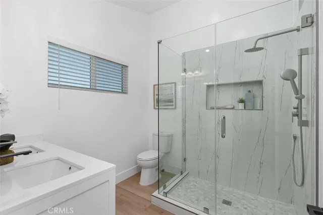 a bathroom with a sink a toilet and a bathtub