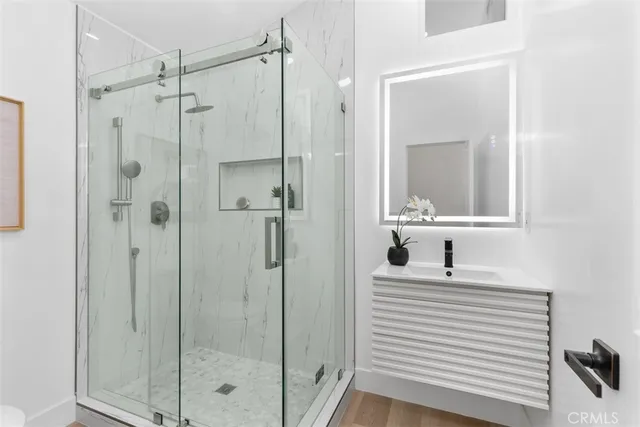 a room with cabinets and wooden floor