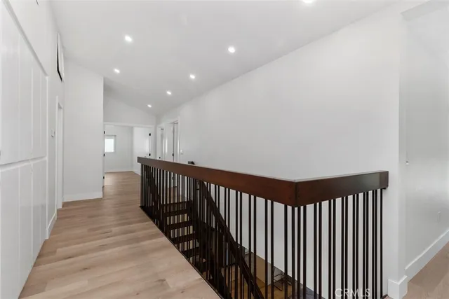 a view of a house with backyard sitting area and garden