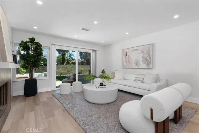 a living room with furniture and a couch