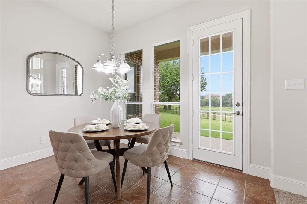 2841 Meadow Ridge Drive Prosper, TX 75078 - Photo 17 of 40 a dining room with furniture and window