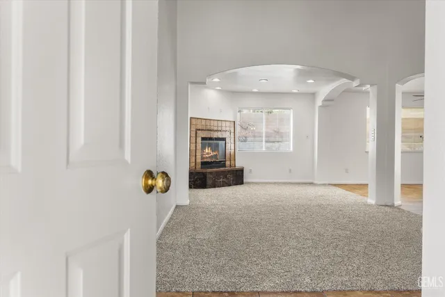 a view of a hallway with staircase