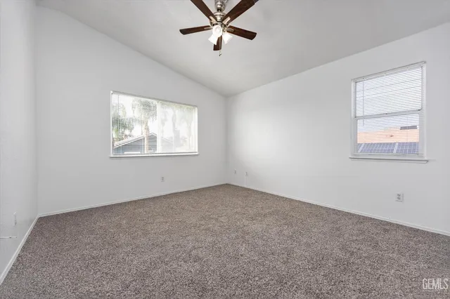 a bathroom with a double vanity sink and mirror