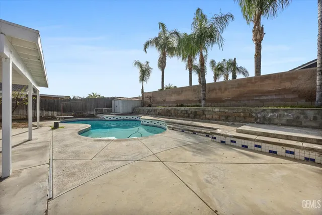 a view of a house with a swimming pool