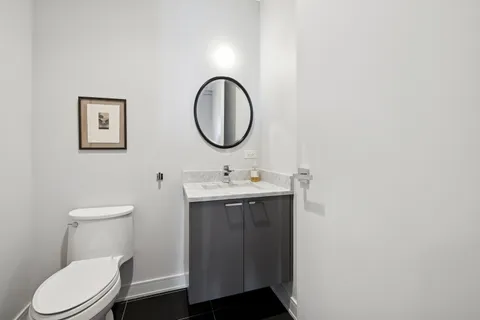 a view of a balcony with lake view and wooden floor