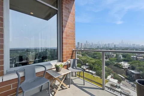 a view of a terrace with furniture