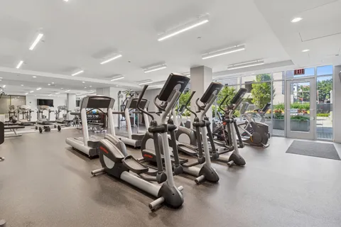 a picture of a bench in front of a wall